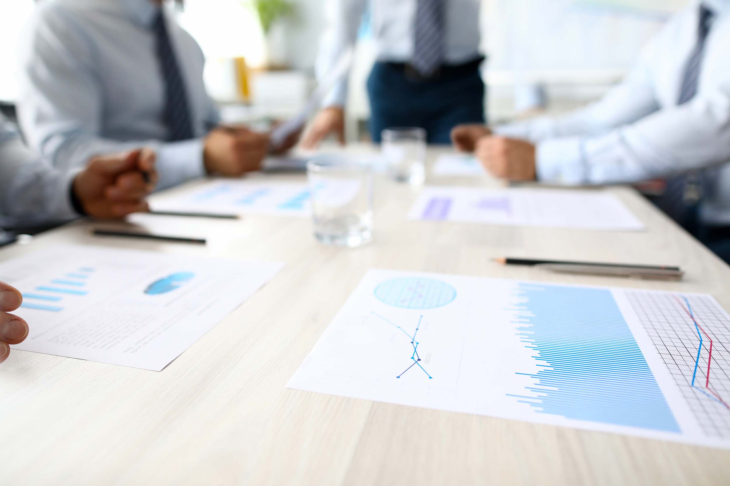 Coworkers looking at charts.