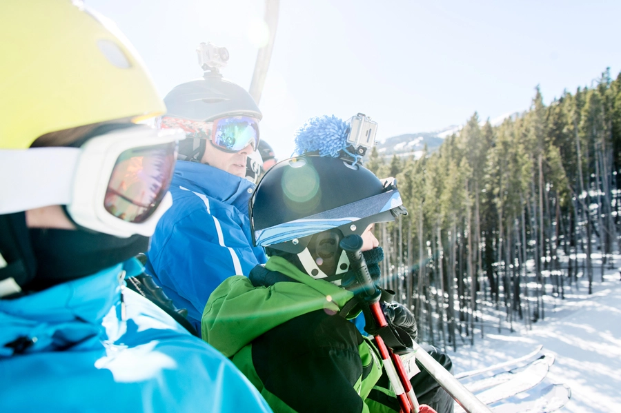 Family on a ski lift.